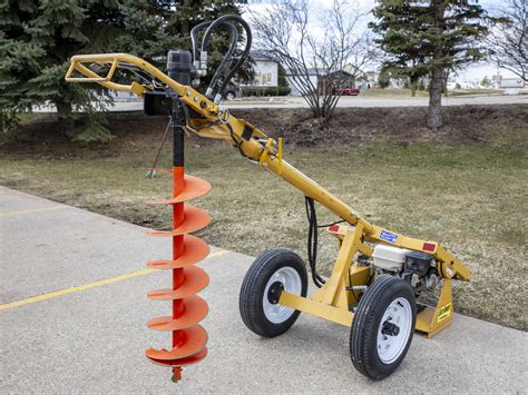 mini digger with auger hire|mini digger post hole auger.